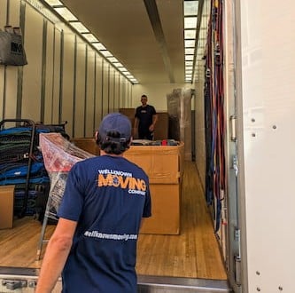 Crew coordinating a move outside a customer’s home